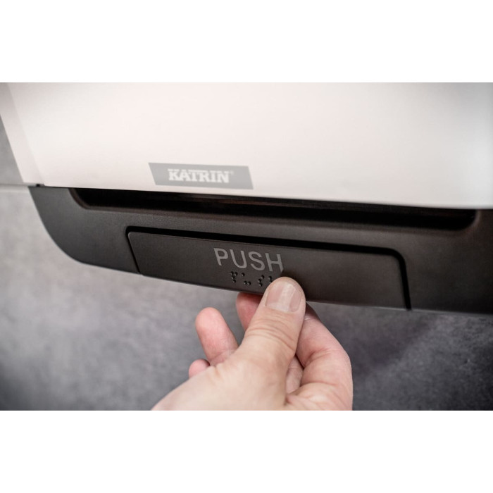 Білий диспенсер рулонних рушників з автоподачею і кнопкою PUSH